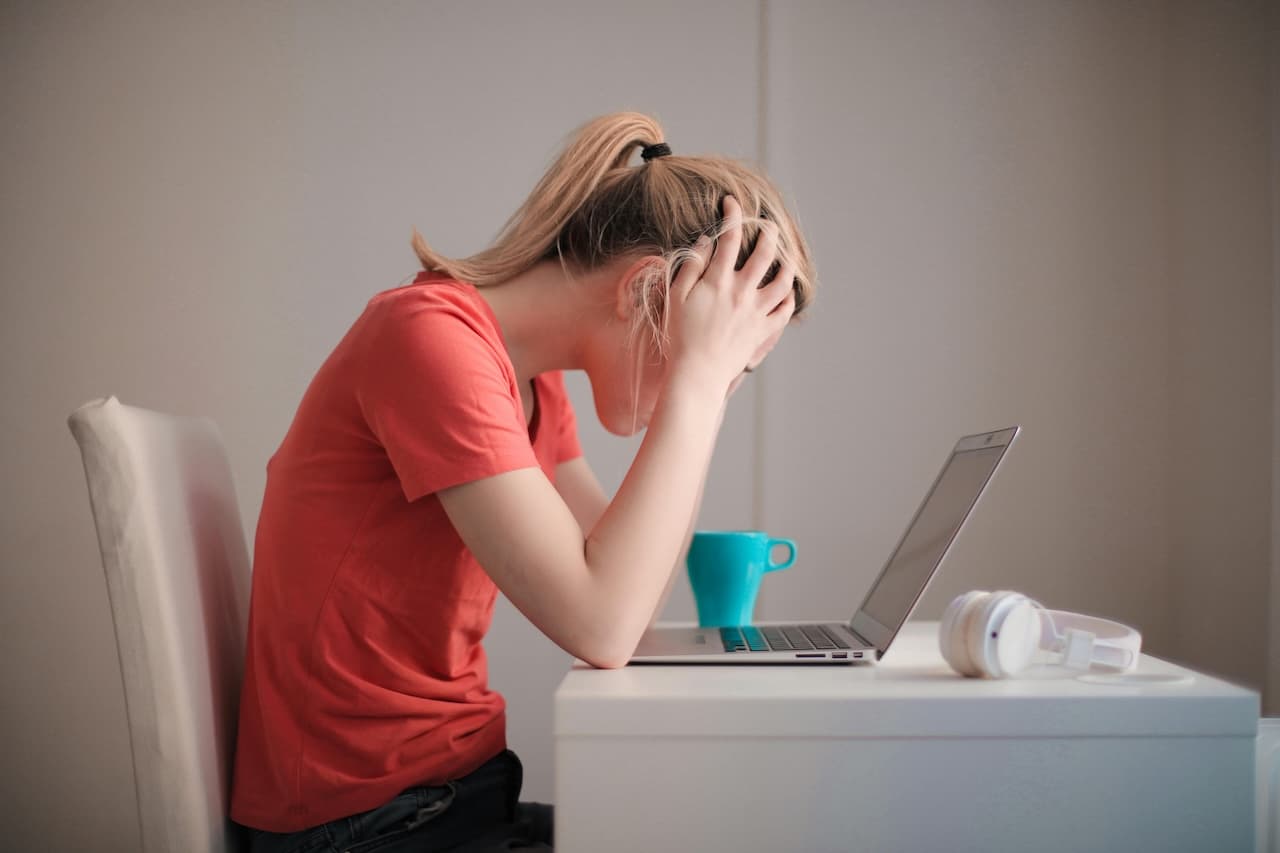 Photo by Andrea Piacquadio: https://www.pexels.com/photo/woman-in-red-t-shirt-looking-at-her-laptop-3755761/